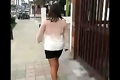 Colombian puta walks barefoot in street for money